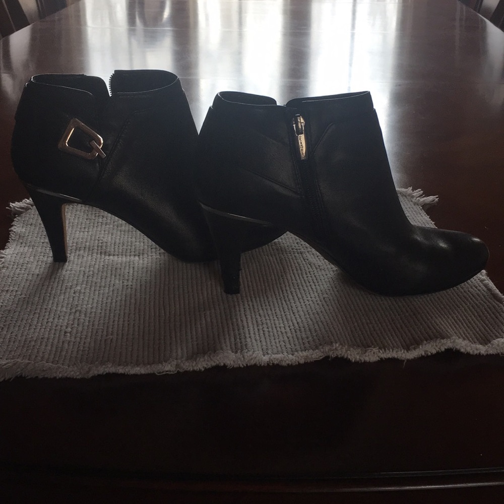 Vince Camuto boots. Size eight.